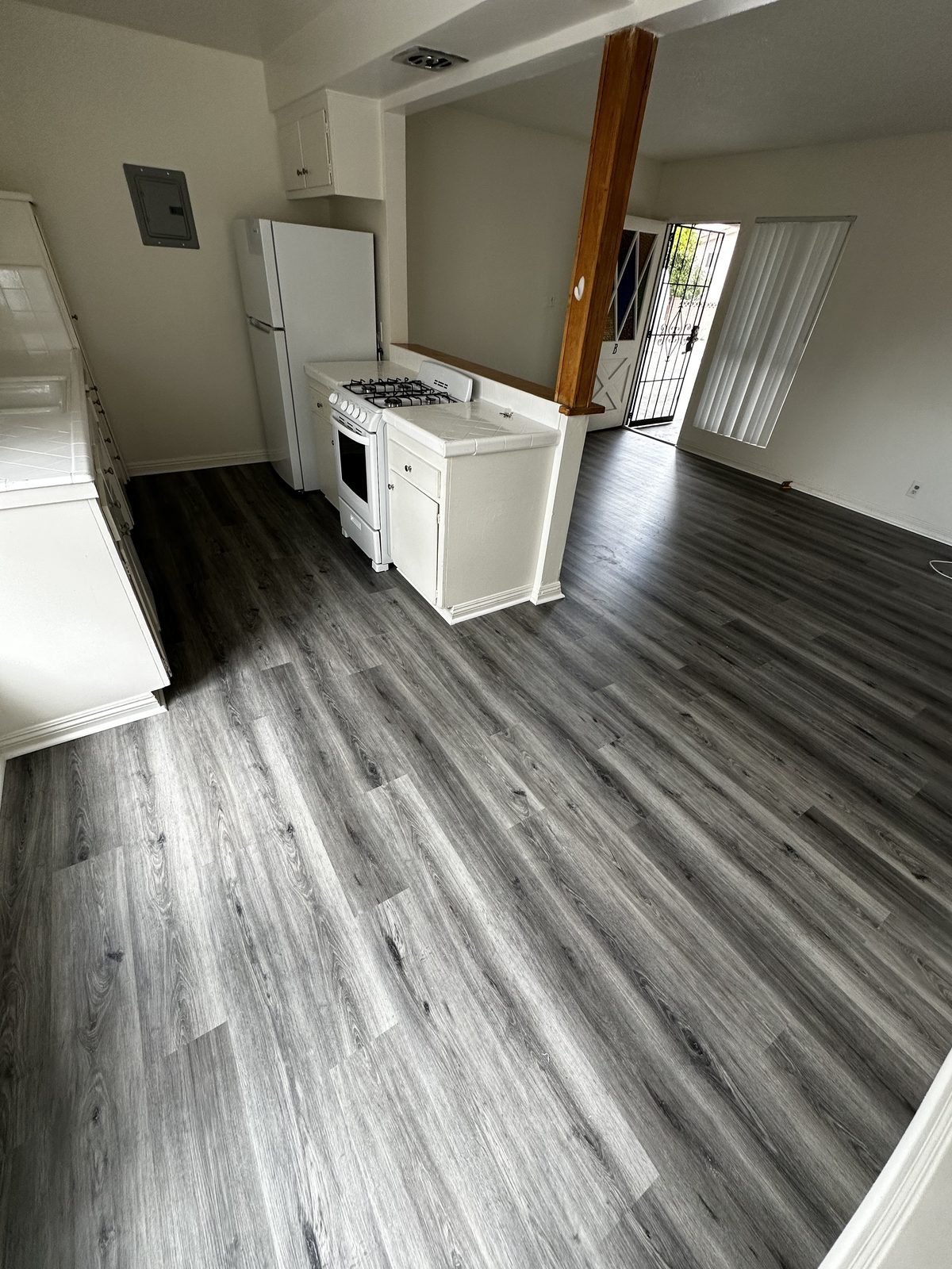 Finished interior restoration — luxury vinyl plank flooring